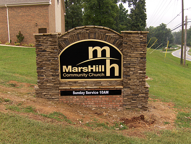 Routed HDU Sign on Brick Monument