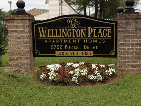 Apartment Entrance Sign with Brick Columns