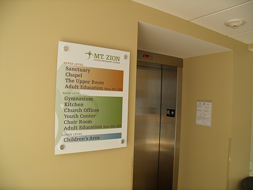 Directional Acrylic Sign with Aluminum Standoffs