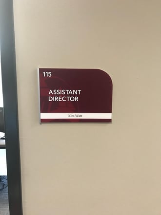 Shaped ADA Braille Sign with Logo in Background, Name Slot and Decorative Aluminum Trim, Acworth Recreation Center ADA Sign