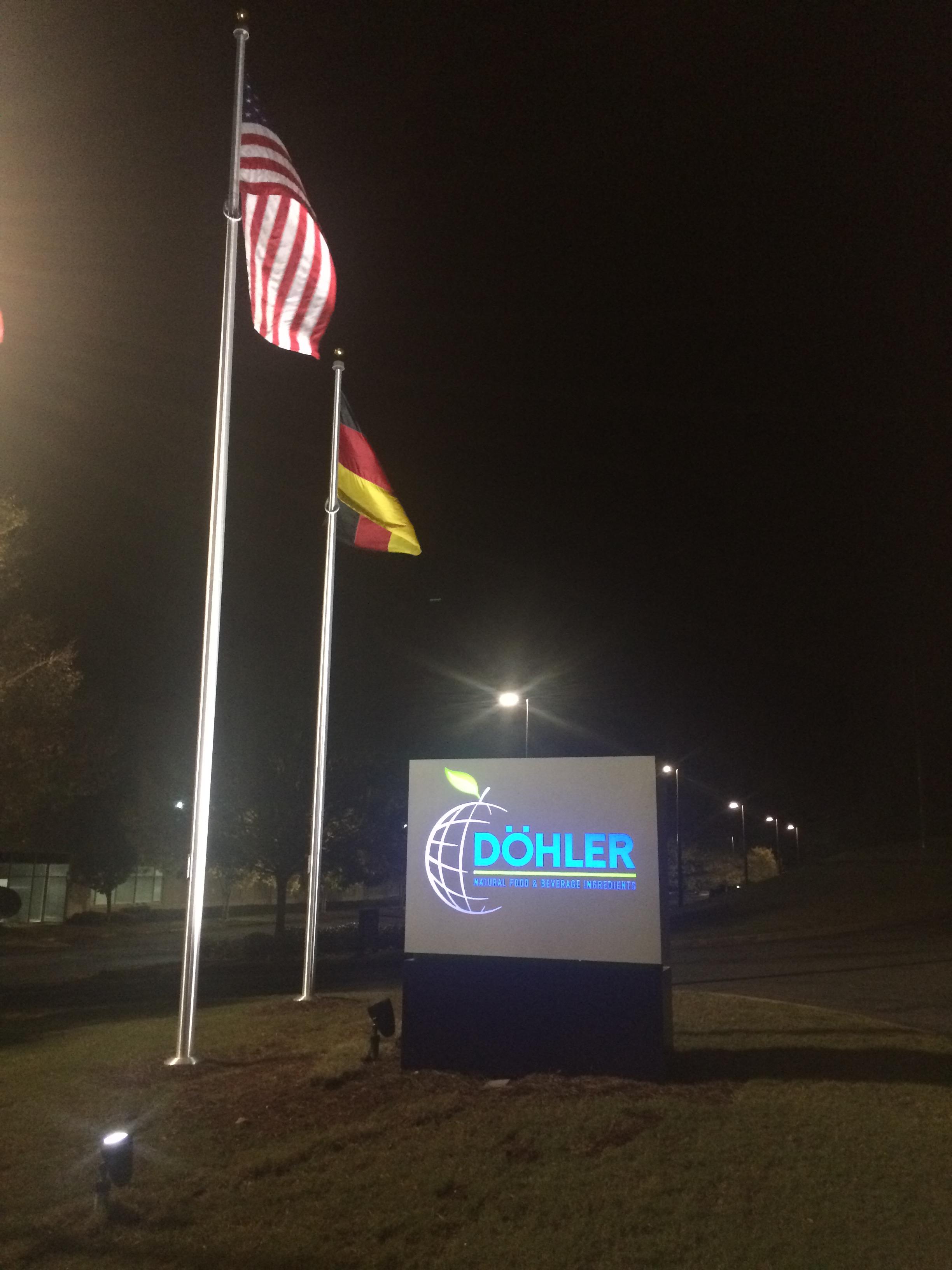 Lighted-Monument-Sign, internally lighted business monument sign at night