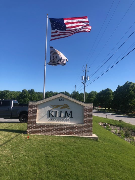 Monument Sign with Flag behind, Brick and 3-Dimensional Letter Business Monument Sign