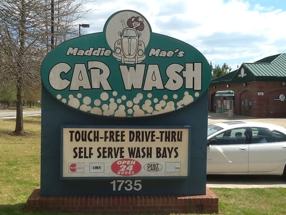 The Old Faded Car Wash Monument Sign