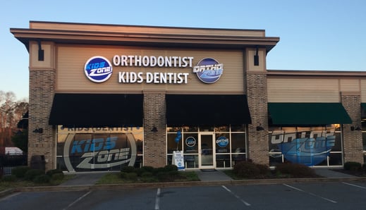 Orthozone-Dallas-Channel Letter Sign - Window Perf, lighted dentist channel letter sign with logo boxes