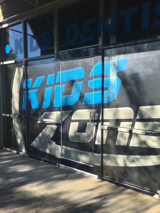 Orthozone - Dallas - Window Perf - Window Vinyl, business window sign