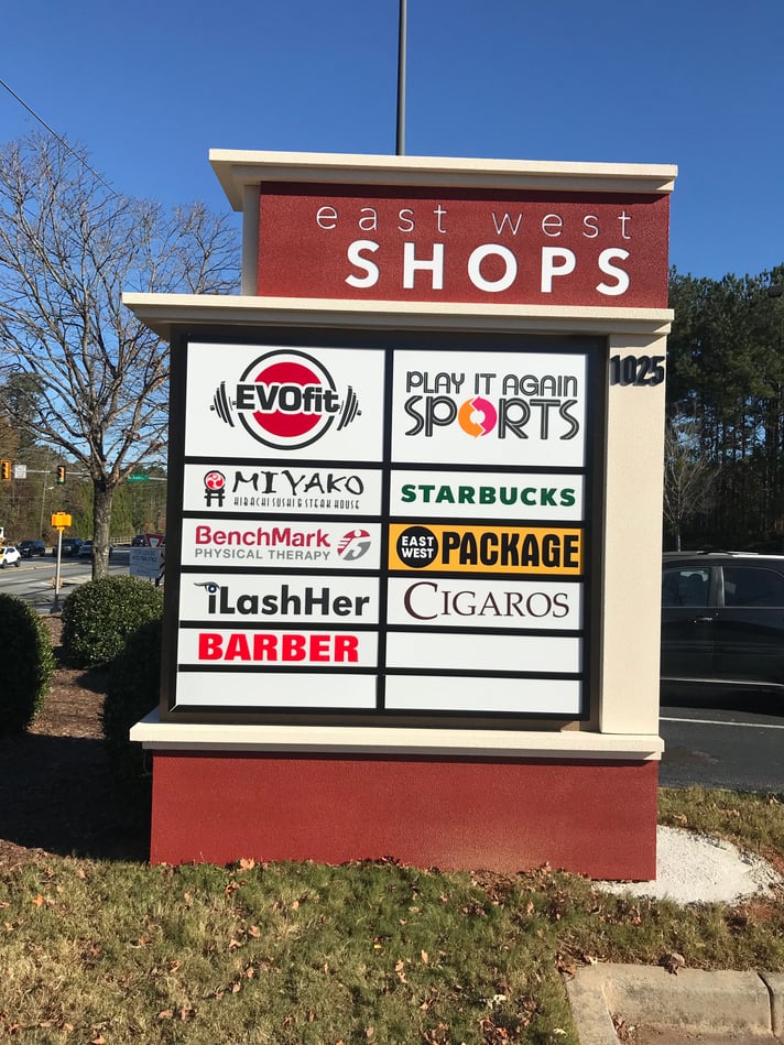Lighted Tenant Panel Pylon Sign - East-West Shops