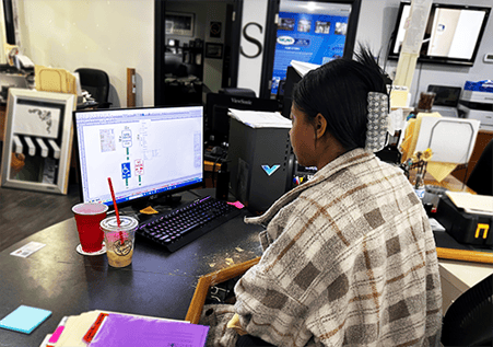 signs and more designer