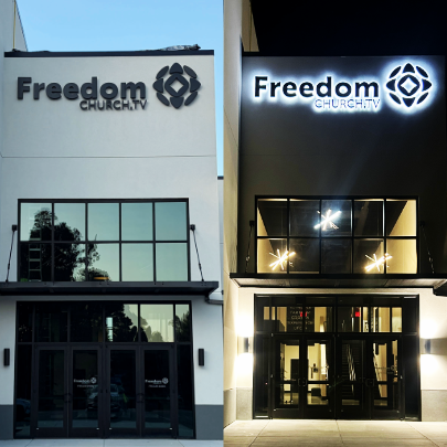 Day and night views of halo-lit channel letters installed on the exterior of Freedom Church in Acworth, GA.