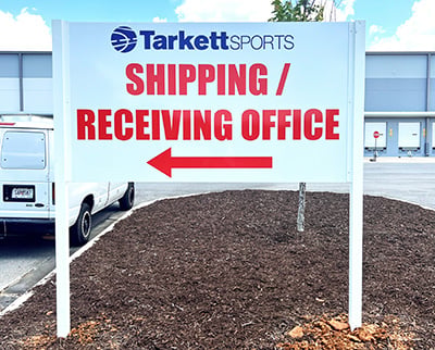 directional exterior post and panel sign for Tarkett Sports in Adairsville, Georgia
