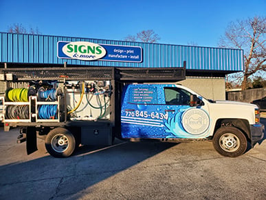 Partial fleet truck wrap by full service sign company in metro Atlanta
