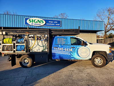 Partial fleet truck wrap by full service sign company in metro Atlanta