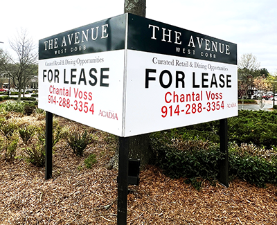 post and panel real estate sign